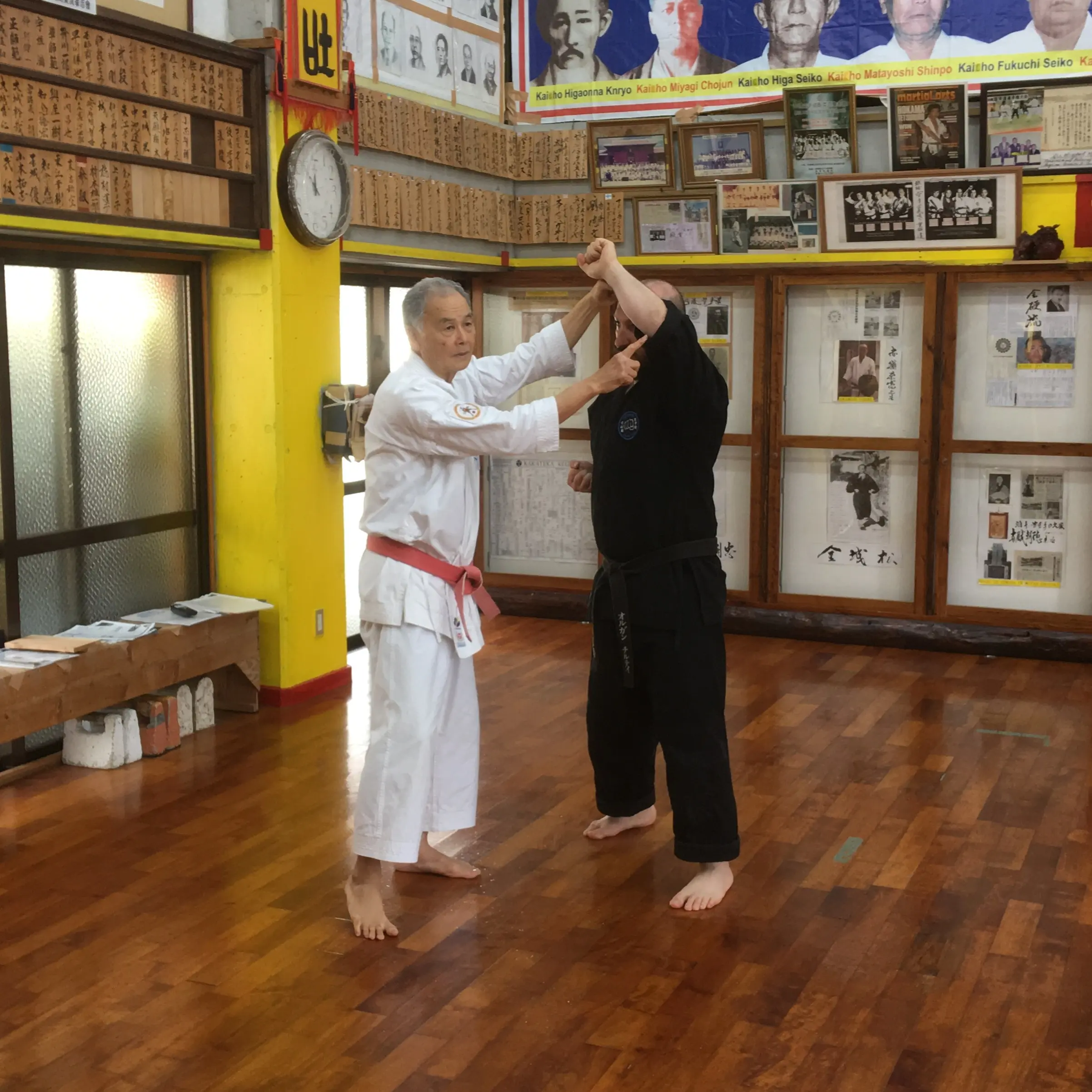 Olgun Tiltay studying head level interceptor in Okinawa with Tetsuhiro Hokama Sensei [10th Dan] Gojuryu Karate